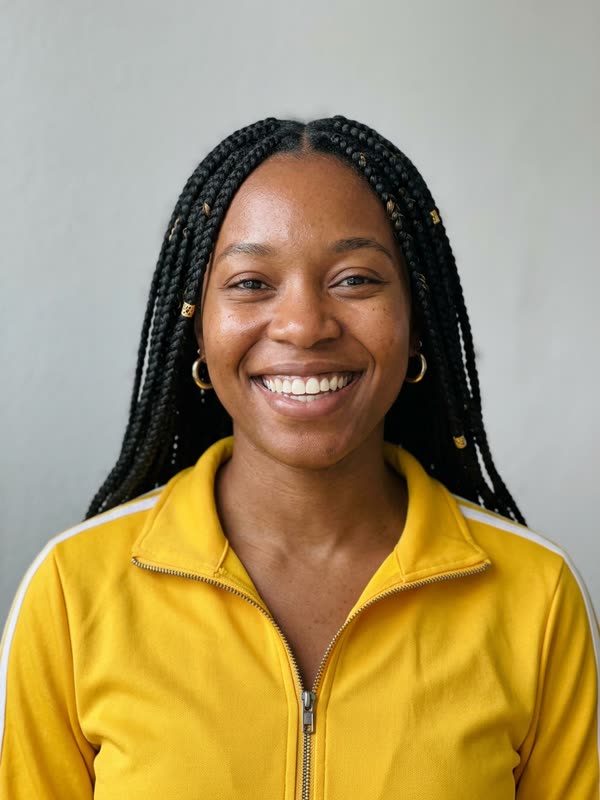 Before: fictional woman with box braids in a yellow track jacket